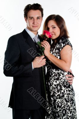 man gives a woman flowers