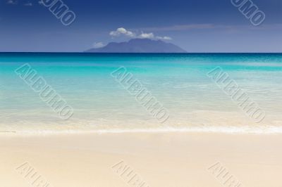 Beautiful surfing tropical sand beach on sunny summer day
