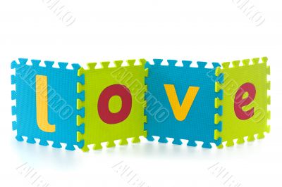 Love - sign with alphabet puzzle letters isolated on white backg