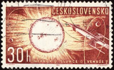 Postage stamp with spaceship, Sun, Mercury and Venus