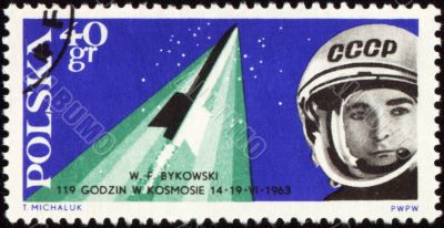 Postage stamp with soviet spaceship Vostok-5 and cosmonaut Valery Bykovsky