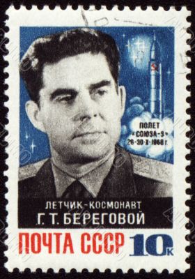 Portrait of soviet cosmonaut Georgy Beregovoy on post stamp