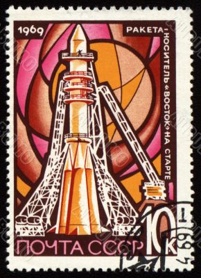 Post stamp with space rocket Vostok on launch pad