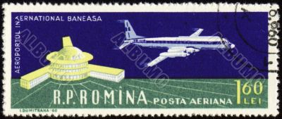 Airport of Bucharest and large plane on post stamp