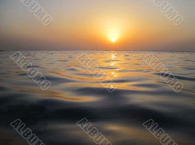 soft waves in warm sunset