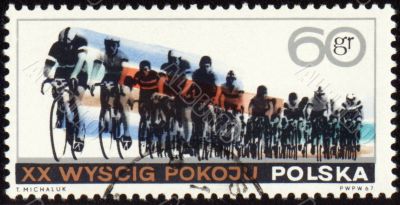 Post stamp shows group of cyclists