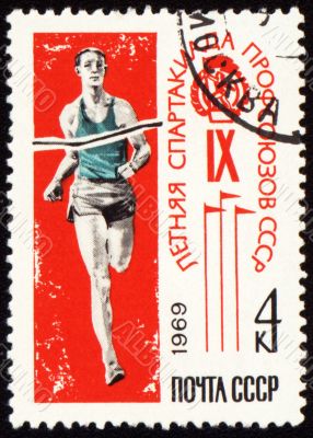 Post stamp shows running sportsman