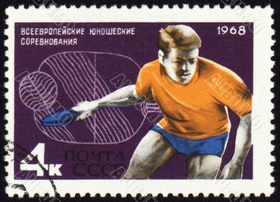 Table tennis player on post stamp