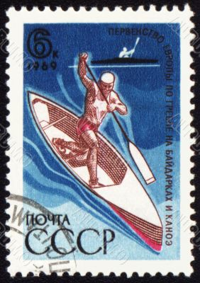 Canoe oarsman on post stamp