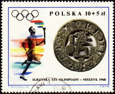 Sportsman with torch on post stamp of Poland Sportsman with torch on post stamp of Poland