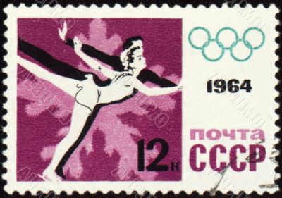 Figure skaters on post stamp