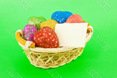 Basket full of the colorful heart shaped toys