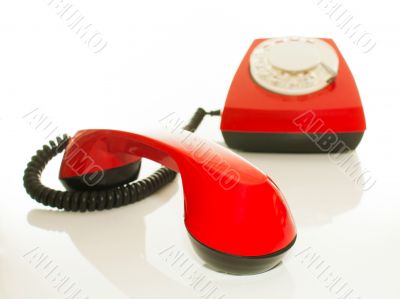 Red old fashioned telephone - Contact us concept