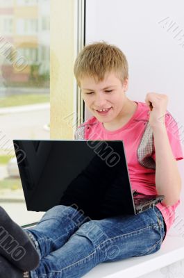 teenager with laptop
