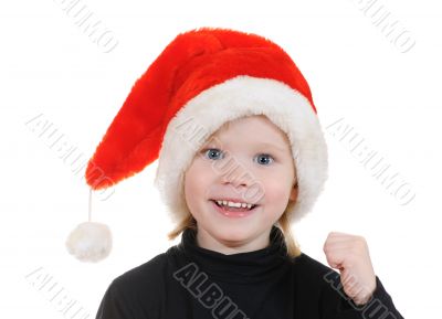 The child in a hat santa claus