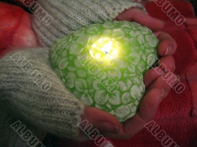Valentine heart and heart shape candle in woman hands Valentine heart and heart shape candle in woman hands