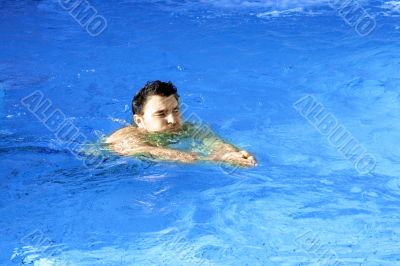 man swimming during a competition