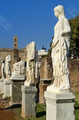 Ancient Roman statues on pedestals