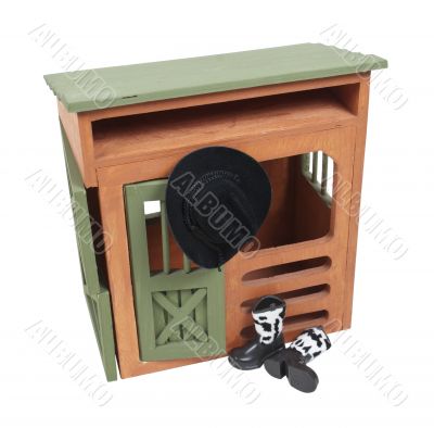 Wooden Barn with Cowboy Hat and Boots 