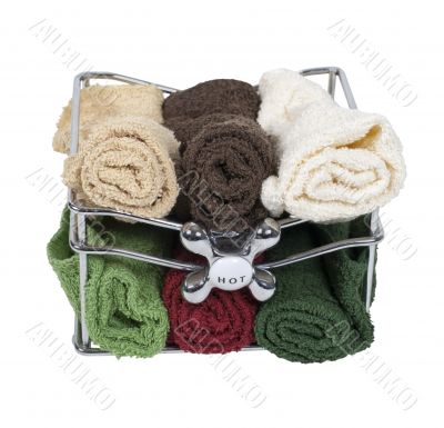 Bath Towels in a Basket with Faucet Handle