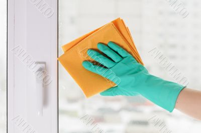 hand in a green glove