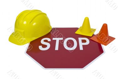 Stop Sign with Hard Hat and Safety Cones