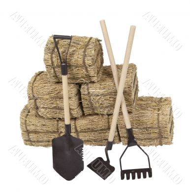 Tools Leaning on a Stack of Hay