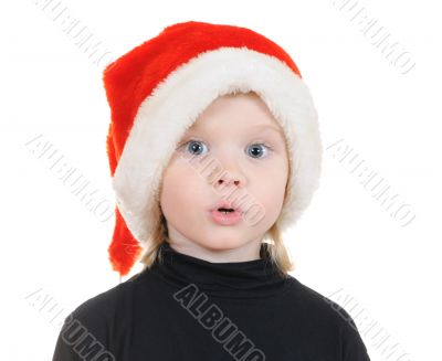The child in a hat santa claus