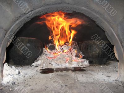 Flame in the furnace with pig-iron