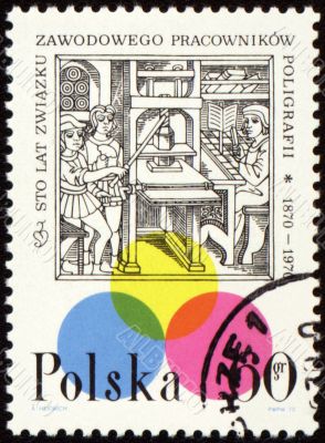 Medieval printing office on post stamp