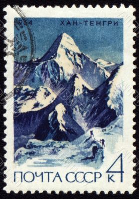 Khan Tengri peak in Central Tien Shan on post stamp