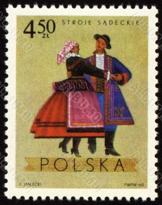 Polish folk dancers from Sadecki region on post stamp