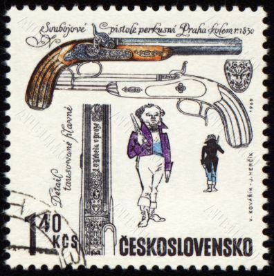 Ancient pistol on post stamp