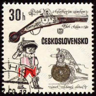 Ancient pistol on post stamp