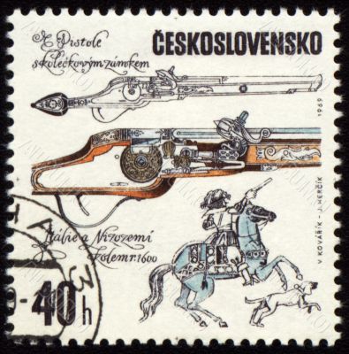 Ancient pistol on post stamp