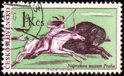 Injun buffalo hunting on post stamp Injun buffalo hunting on post stamp