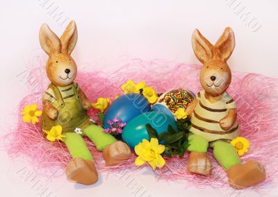 toy Easter rabbits and dyed eggs