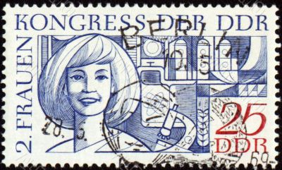 Portrait of young woman on post stamp