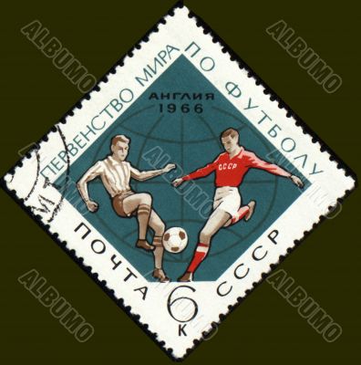 Football players on post stamp