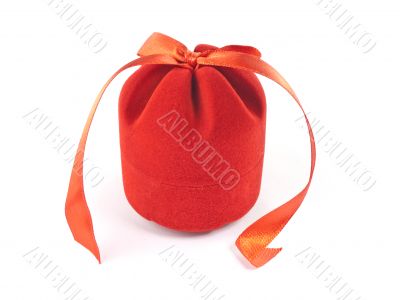 The isolated closed red gift box The isolated closed red gift box