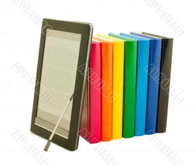 Stack of colorful books and electronic book reader Stack of colorful books and electronic book reader