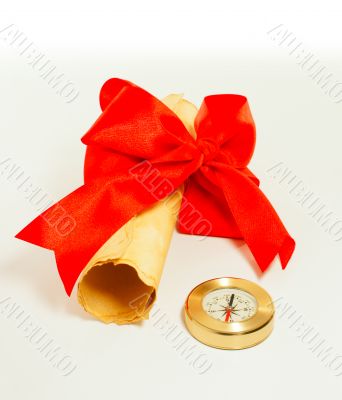 Ancient scroll tied up by red ribbon and compass Ancient scroll tied up by red ribbon and compass