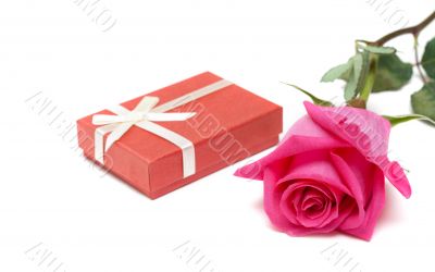 Red gift box and rose