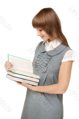 Young girl reads book