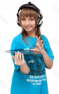 Girl in earphone with vinyl disk