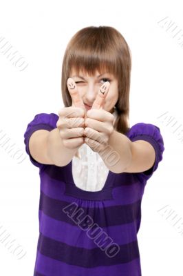 Young beautiful girl shows Ok