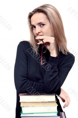 Beautiful girl with spectacles and book