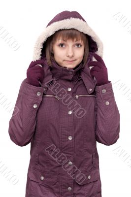Girl in winter violet hooded jacket