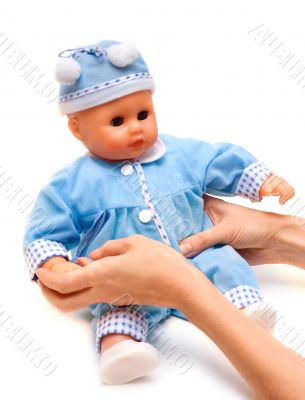 Nursery doll in blue suit