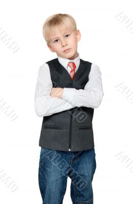 Portrait of the boy in vest and tie